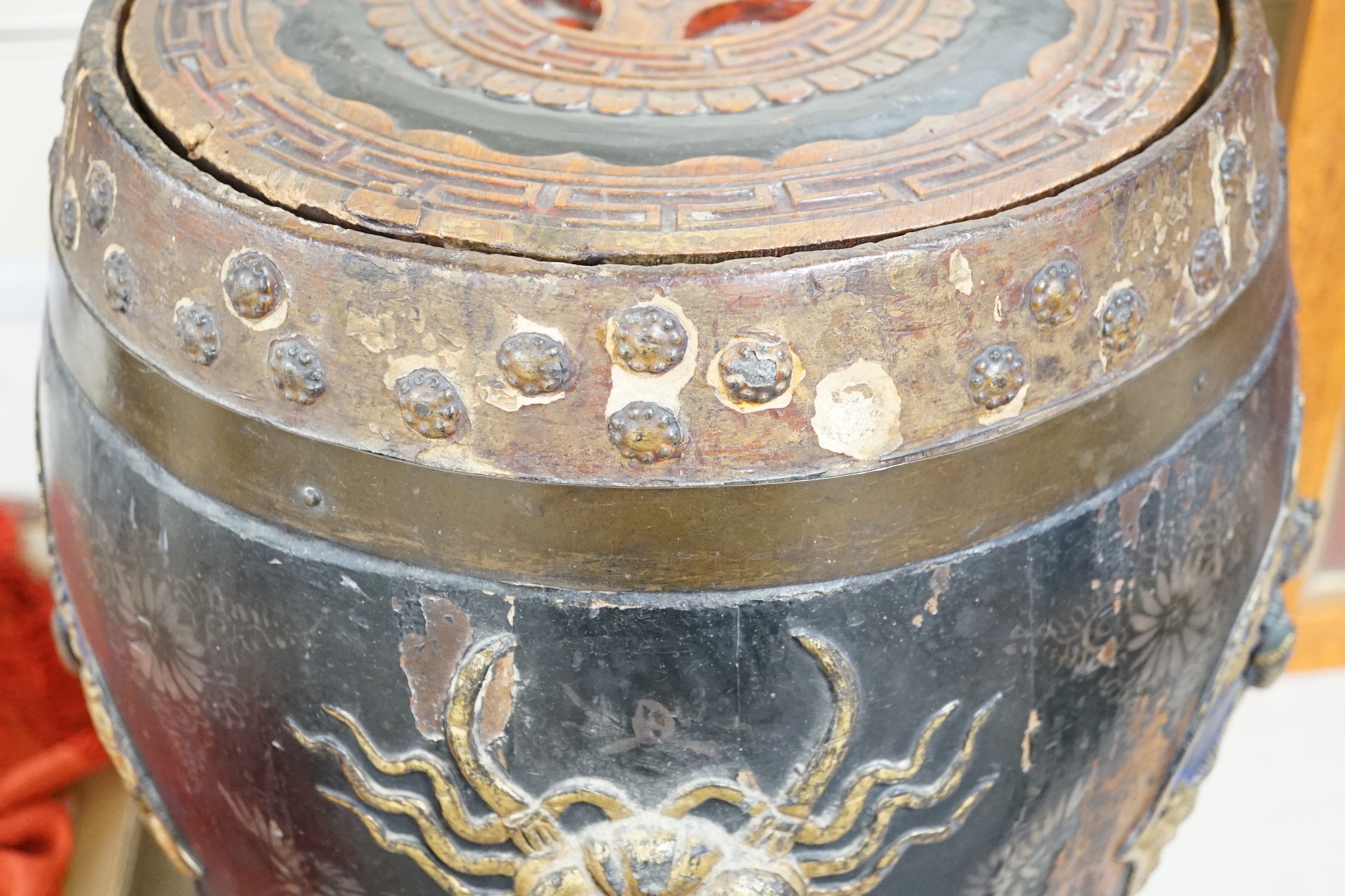 A Chinese lacquer decorated wood barrel form seat/storage container, 40cms high